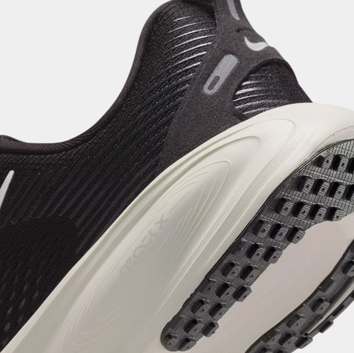 Vomero 18 Grade School Running Shoes (Black/Coconut Milk/Iron Ore/Summit White)